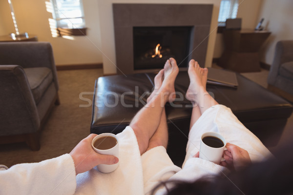 Couple relaxing while having coffee in the living room Stock photo © wavebreak_media