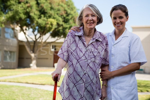 Portrait of happy doctor and senior woman Stock photo © wavebreak_media