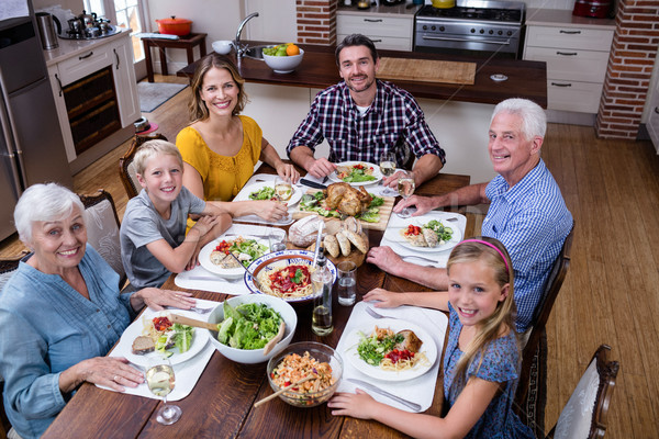 Portrait famille repas cuisine maison fille [[stock_photo]] © wavebreak_media