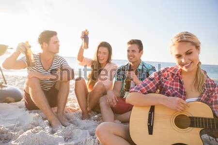 Friends playing the guitar Stock photo © wavebreak_media