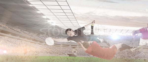 Composite image of a rugby player scoring a try Stock photo © wavebreak_media