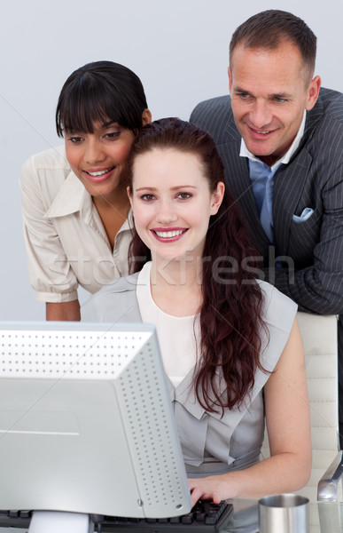 Smiling international Business people working together Stock photo © wavebreak_media