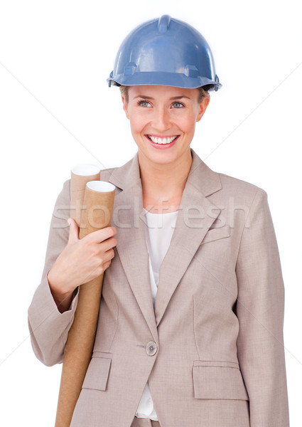 Confident female architect holding blueprints Stock photo © wavebreak_media