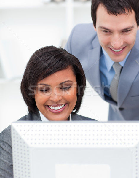 Deux positif collègues travail ordinateur bureau [[stock_photo]] © wavebreak_media