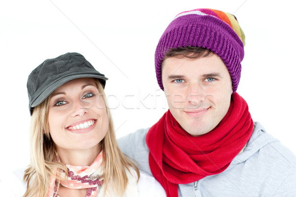 Charming couple looking at the camera together Stock photo © wavebreak_media