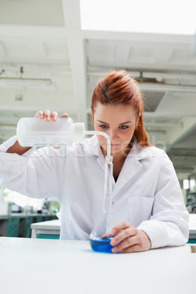 Portrait of a science student doing an experiment in a laboratory Stock photo © wavebreak_media