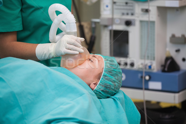 Krankenschwester Sauerstoffmaske Theater Frau medizinischen Krankenhaus Stock foto © wavebreak_media