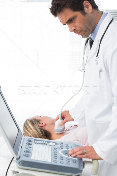 Doctor using sonogram on female patient Stock photo © wavebreak_media