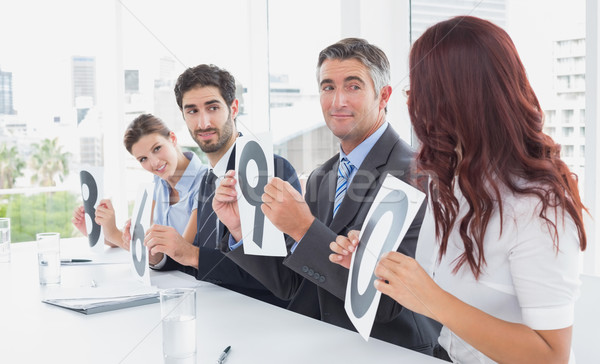 Stock photo: Business team giving out ratings