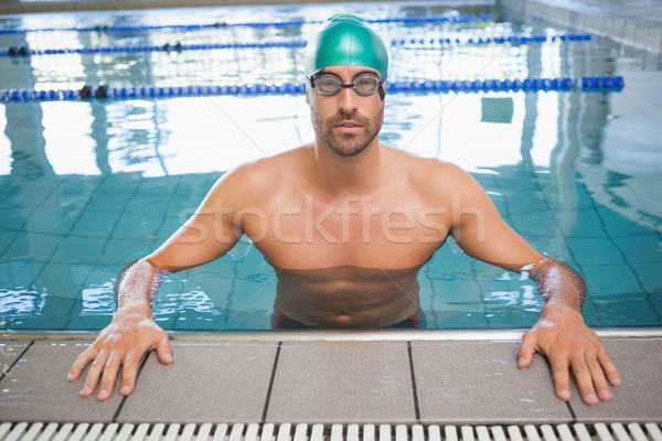 Stock photo: Portrait of a fit swimmer in the pool