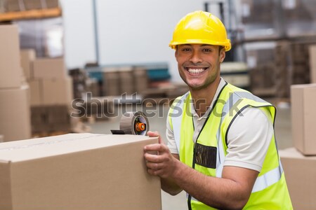 Worker preparing goods for dispatch Stock photo © wavebreak_media