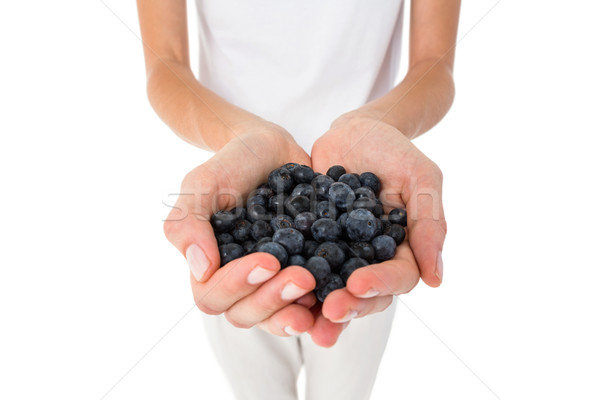 Woman holding blueberries Stock photo © wavebreak_media