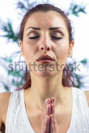 Close up view of a pretty girl touching her chin  Stock photo © wavebreak_media