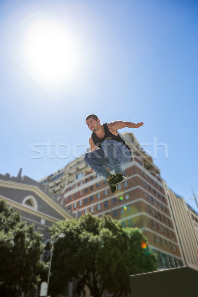 Athletic man doing parkour in the city Stock photo © wavebreak_media