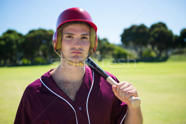 Porträt jungen Spieler halten Baseballschläger stehen Stock foto © wavebreak_media