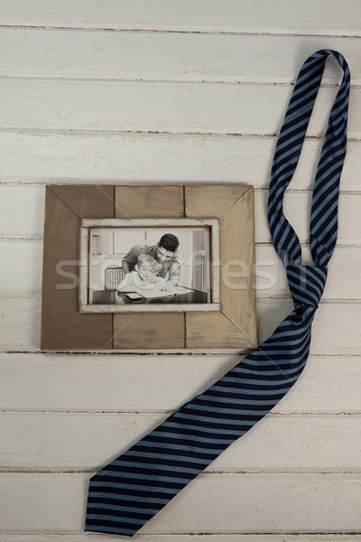 Necktie by photograph on table Stock photo © wavebreak_media
