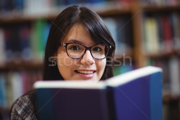 Kadın öğrenci kitap kolej kütüphane Stok fotoğraf © wavebreak_media