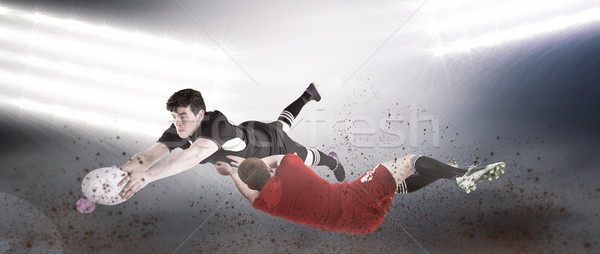 Composite image of a rugby player scoring a try Stock photo © wavebreak_media