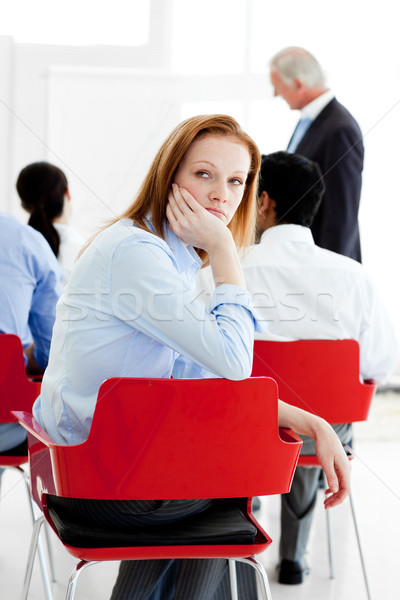 Jóvenes mujer de negocios aburrido conferencia colegas reunión Foto stock © wavebreak_media