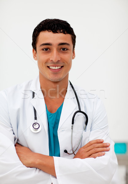 привлекательный мужской доктор улыбаясь камеры глядя бизнеса Сток-фото © wavebreak_media