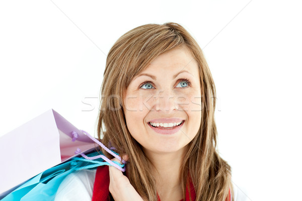 Pensive woman holding shopping bags Stock photo © wavebreak_media