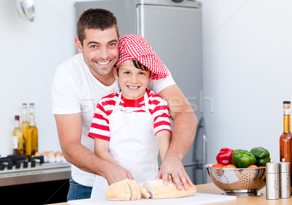 Portrait of a smiling father and his son preparing a meal Stock photo © wavebreak_media