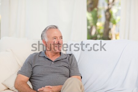 Homme couché lit maison chambre Homme [[stock_photo]] © wavebreak_media