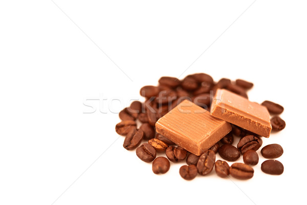 Doua piese ciocolată cafea seminţe alb Imagine de stoc © wavebreak_media