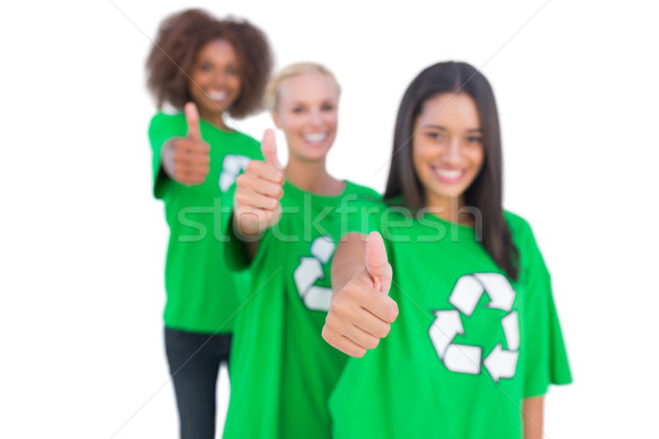 Three smiling enviromental activists giving thumbs up Stock photo © wavebreak_media
