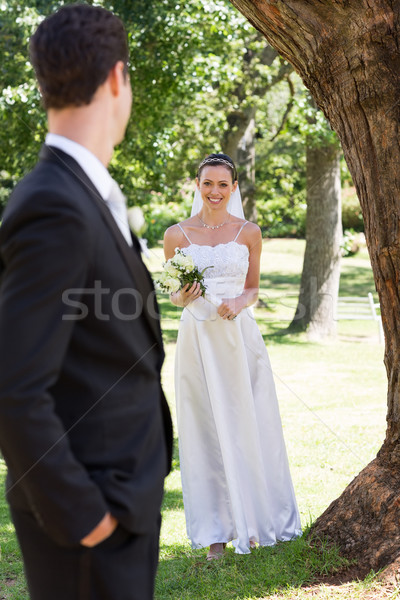 Heureux mariée regarder marié jardin [[stock_photo]] © wavebreak_media