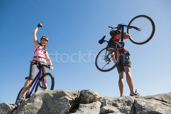 Fit cyclist couple at the summit Stock photo © wavebreak_media