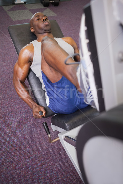 Male weightlifter doing leg presses in gym Stock photo © wavebreak_media