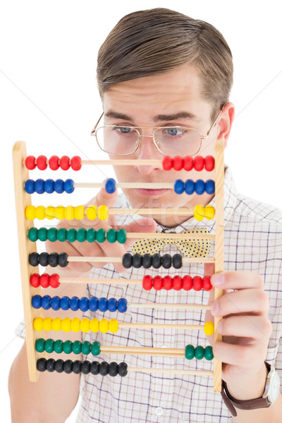 Nerdy hipster adding on abacus  Stock photo © wavebreak_media