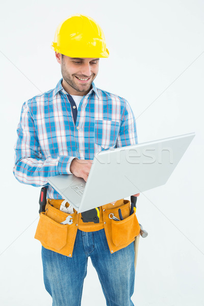 Gelukkig bouwvakker met behulp van laptop witte internet bouw Stockfoto © wavebreak_media