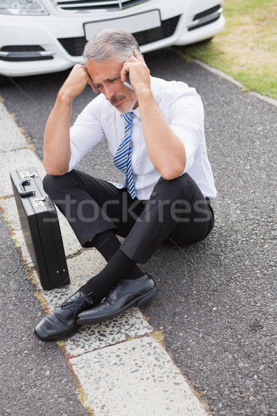 Sad man calling for assistance after breaking down  Stock photo © wavebreak_media