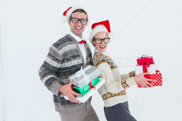 Cuplu cadouri alb modă Imagine de stoc © wavebreak_media