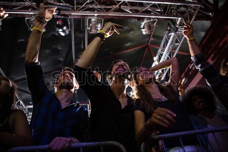 Portrait of male singer performing on stage during music festival Stock photo © wavebreak_media