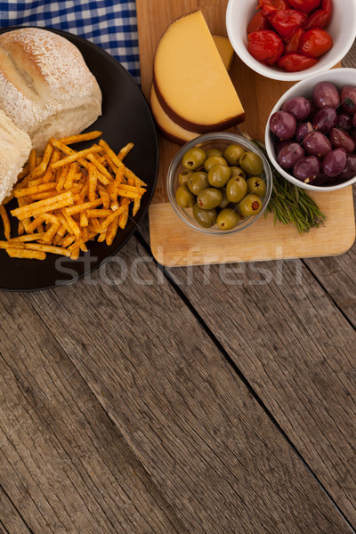 Olives with vegetable and french fries in plate Stock photo © wavebreak_media