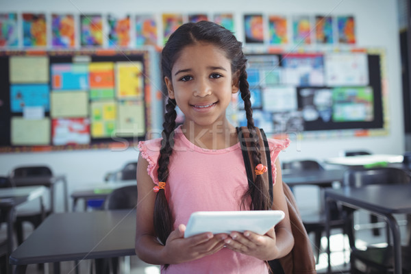 Lány digitális tabletta osztályterem portré könyv Stock fotó © wavebreak_media