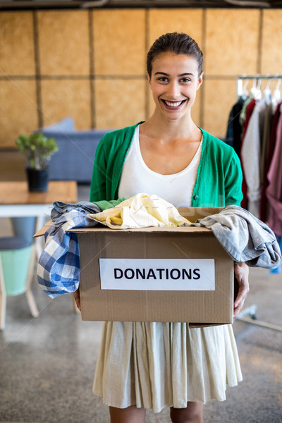 Young woman with donation box Stock photo © wavebreak_media