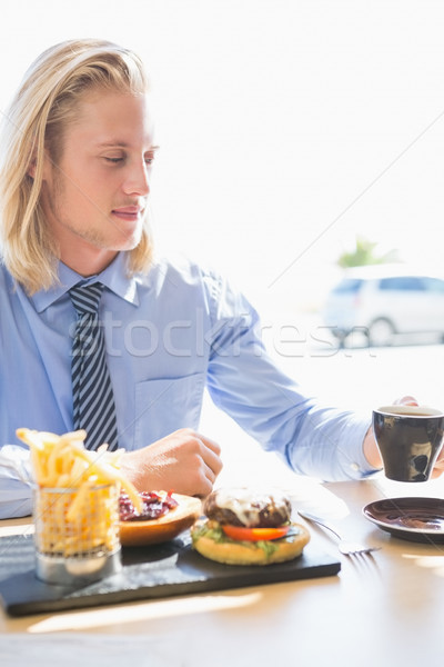 Stock photo: Man having coffee and breakfast