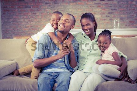 Feliz sorridente família sofá sala de estar casa Foto stock © wavebreak_media