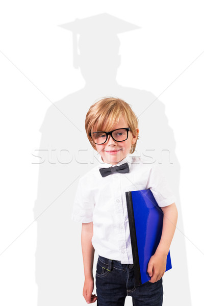 Composite image of cute pupil holding book Stock photo © wavebreak_media