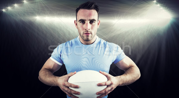 Stock photo: Composite image of rugby player looking at camera