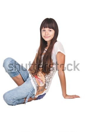 Attractive teenager posing in studio Stock photo © weecy