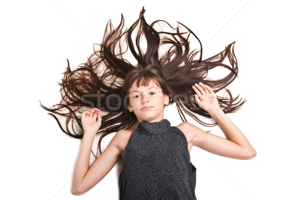 Attractive teenager posing in studio Stock photo © weecy