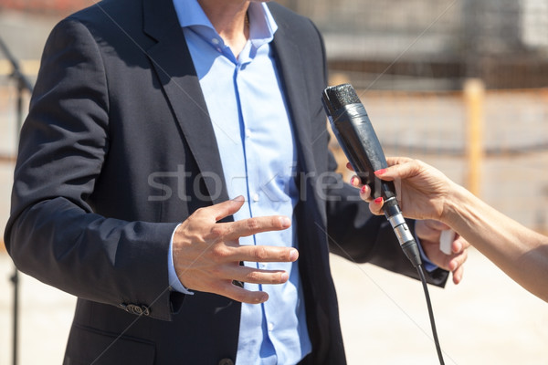 Stockfoto: Media · interview · journalist · zakenman · politicus