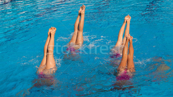 Stock photo: Synchronized swimmers
