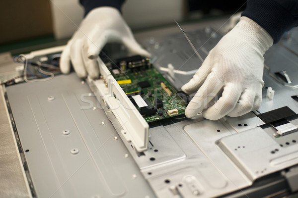 Manual work in electronic industry Stock photo © wellphoto