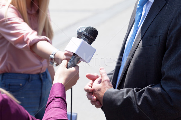 Naciśnij wywiad dziennikarz biznesmen polityk Zdjęcia stock © wellphoto